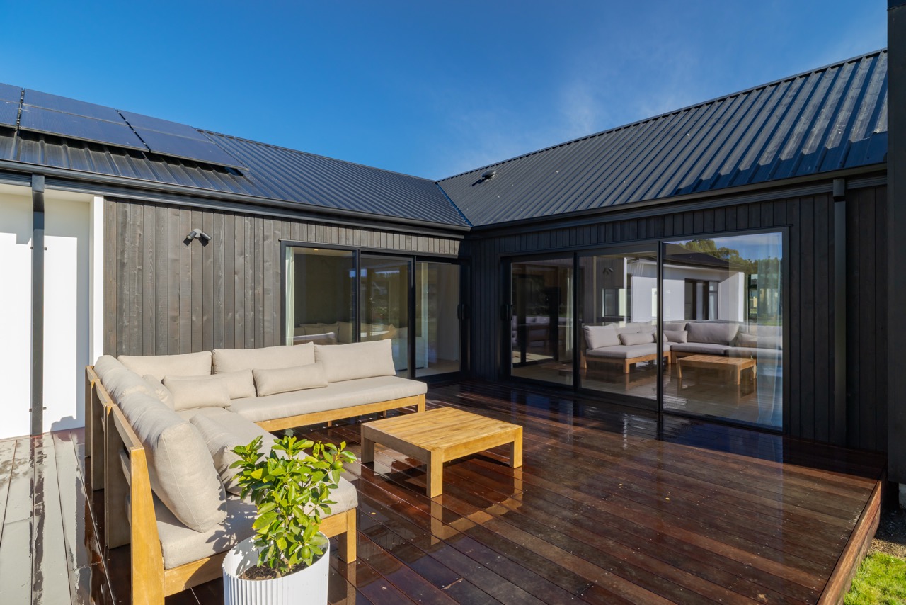 Courtyard view across the deck towards the main living wing